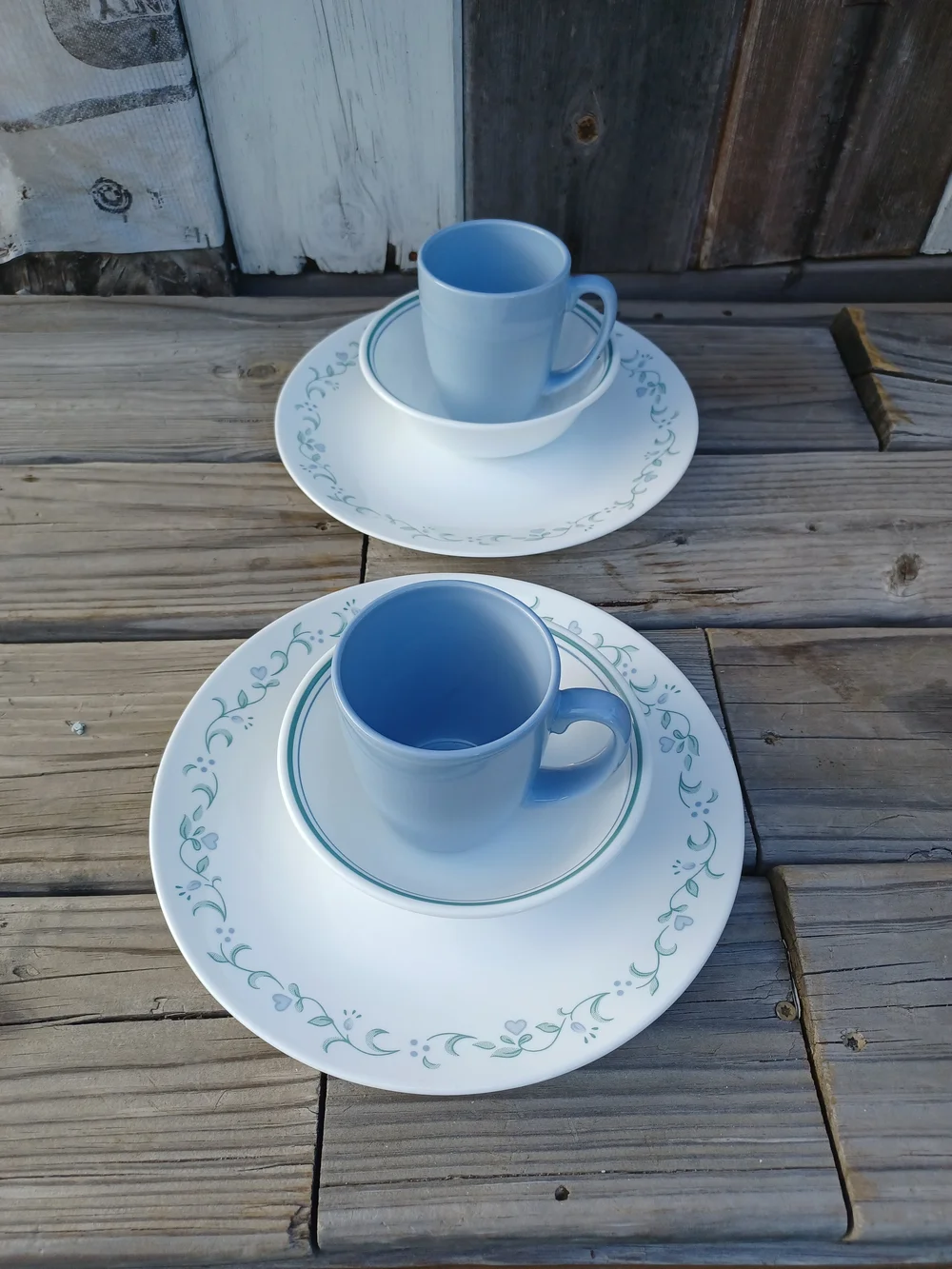 Corelle 2-Place Blue & White Dinnerware with Green Floral Trim